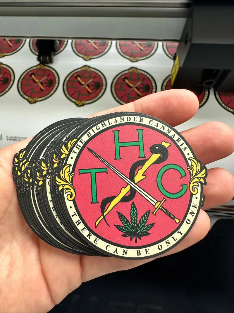 Highlander round thc stickers in hand