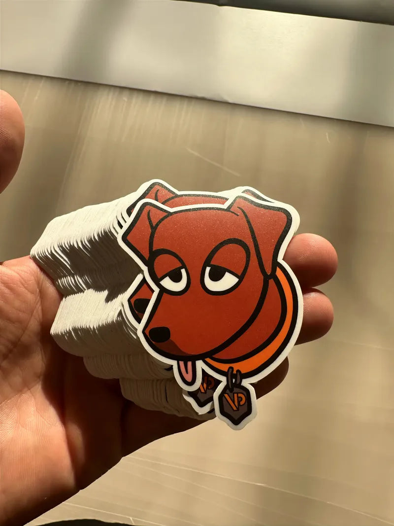 Die cut dog sticker with white border in han