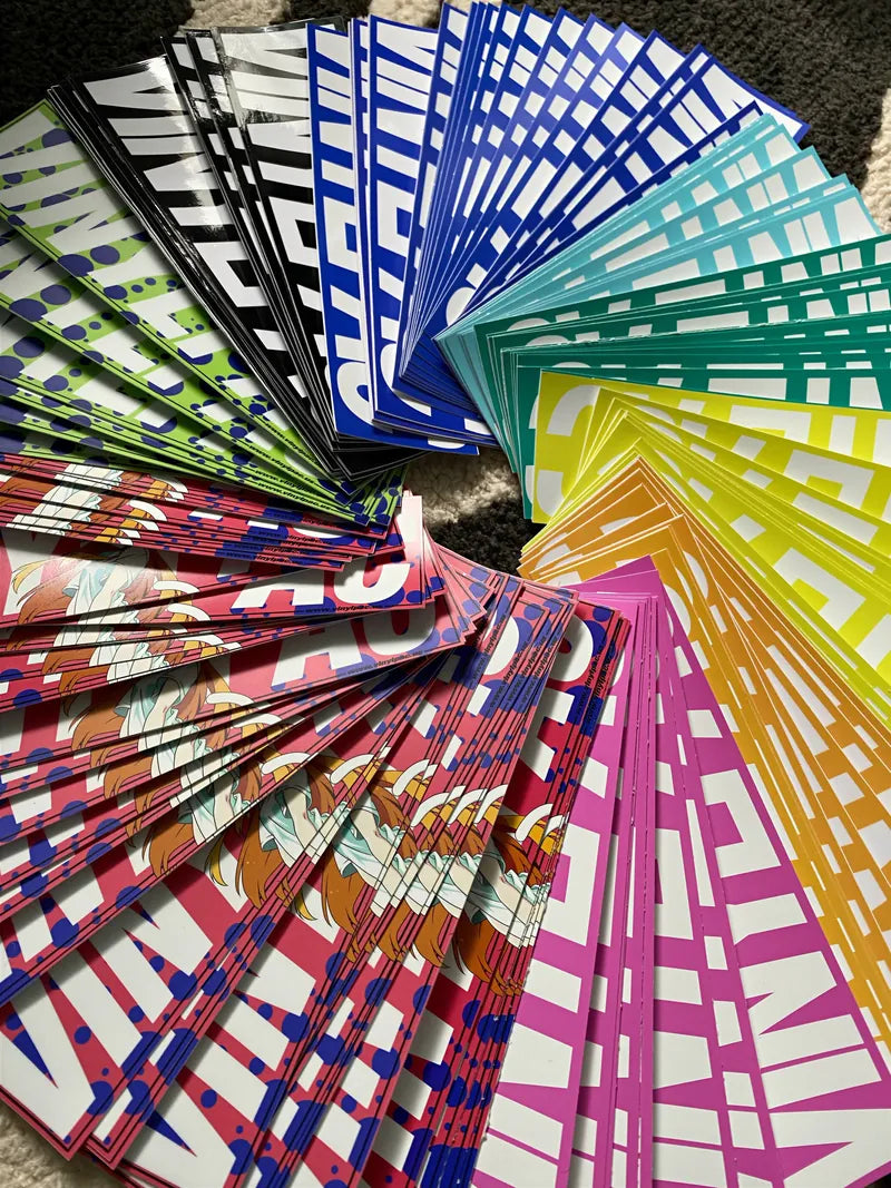 Fan of colored die cut stickers