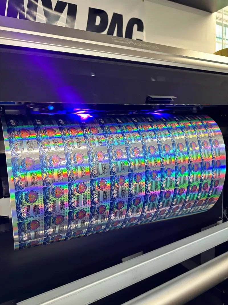VINYLPAC uv printer running holo roll