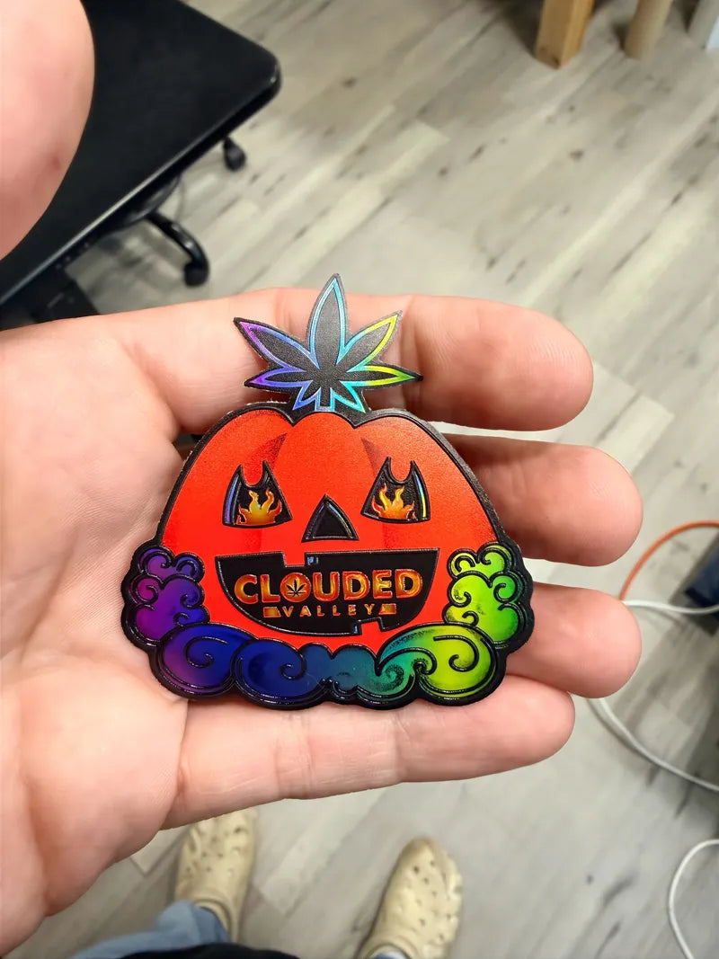 Clouded holo pumpkin die cut in hand