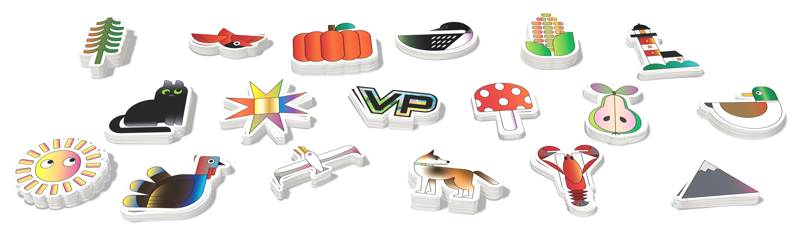 Stacks of die-cut stickers drawn in house: a lighthouse, black cat, pumpkin, sun, mushroom, lobster, turkey, loon, duck and more